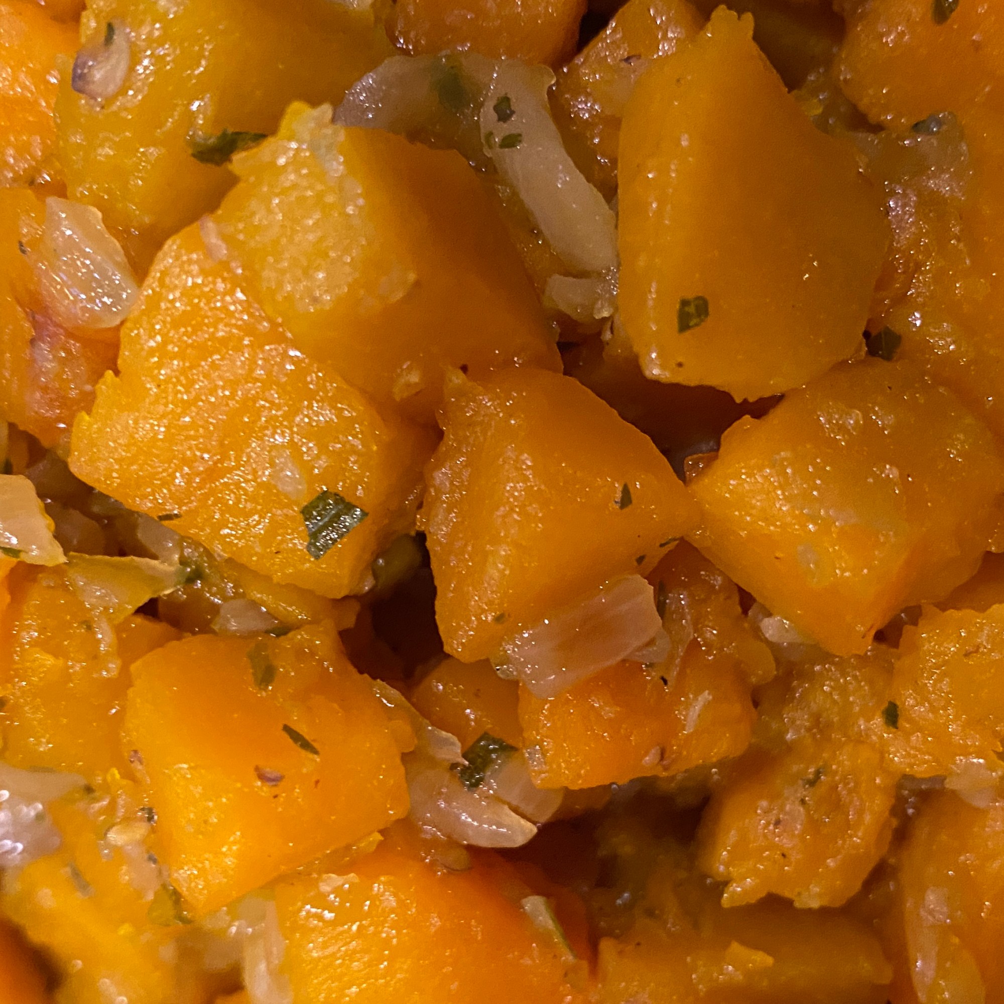 Close Up: Pumpkin cooked in onion and herb blend